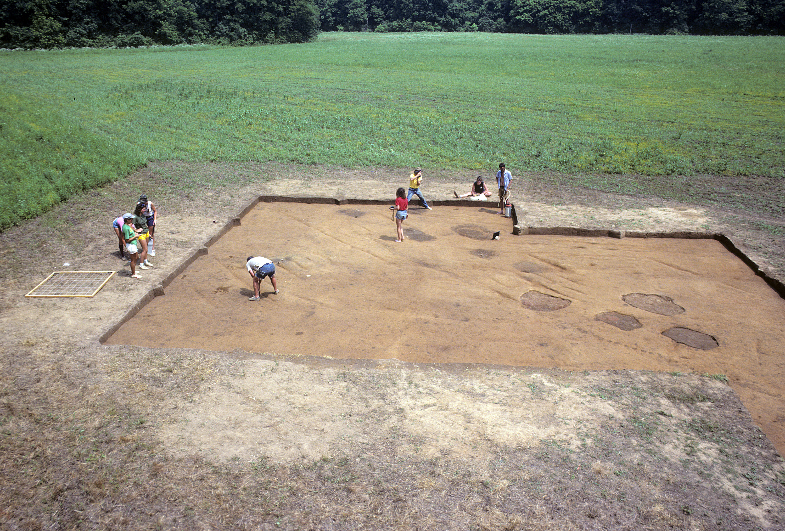 An excavation block at Occaneechi Town with plowed soil removed. The dark stains are archaeological features.